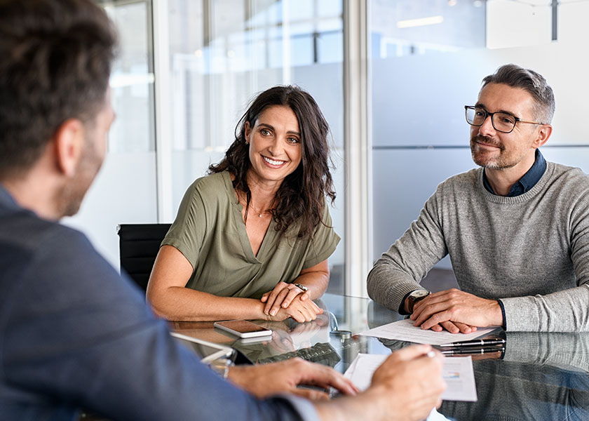 clients meeting with advisor